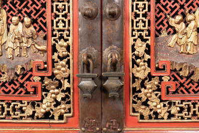 A large and fine Chinese gilt-red-lacquered cabinet with figures and antiquities, 19th C.