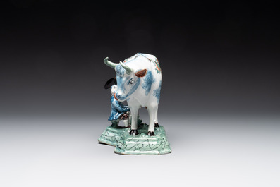 A pair of unusual polychrome Dutch Delft milking groups, 18th C.