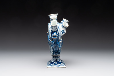 A pair of blue and white Dutch Delft heart-shaped tulip vases, early 18th C.