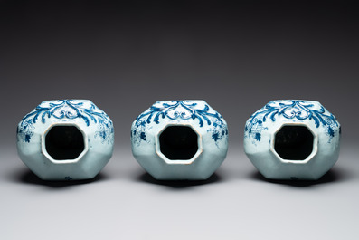 A large blue and white Dutch Delft garniture of five vases and covers, 2nd half 18th C.