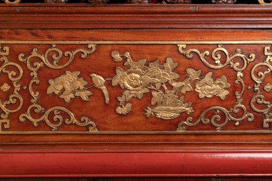 A large and fine Chinese gilt-red-lacquered cabinet with figures and antiquities, 19th C.