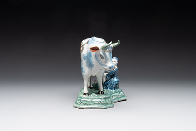 A pair of unusual polychrome Dutch Delft milking groups, 18th C.