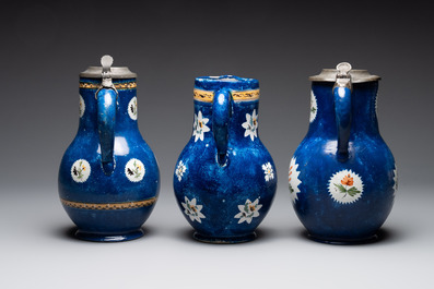 A collection of five polychrome Brussels faience jugs, some with pewter-mounts, 18/19th C.