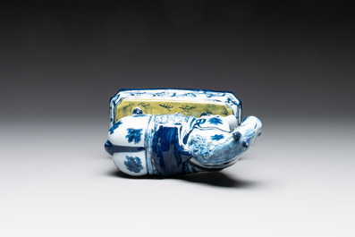 A fine pair of blue and white Dutch Delft horses on a green base, 18th C.