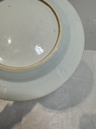 A pair of Chinese famille rose 'mandarin subject' plates, Qianlong