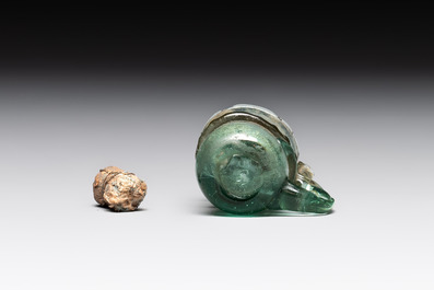 A Dutch or German green glass reliquary holder, excavated in Maastricht, 16/17th C.