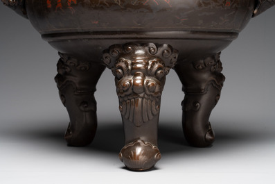 A massive Vietnamese copper- and silver-inlaid 'Buddhist lion' censer and cover on stand, 19th C.