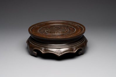 A massive Vietnamese copper- and silver-inlaid 'Buddhist lion' censer and cover on stand, 19th C.
