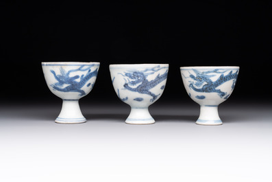 Six Chinese blue and white 'Hatcher cargo' stem cups with dragons, Transitional period