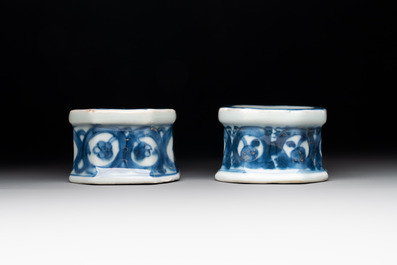A pair of Chinese gilt-decorated blue and white salts, Qianlong