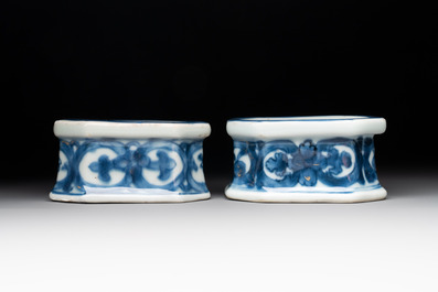 A pair of Chinese gilt-decorated blue and white salts, Qianlong