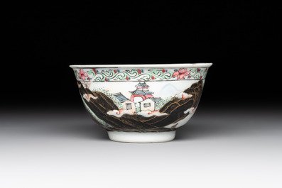 A Chinese famille rose and grisaille 'mountainous landscape' cup and saucer, Yongzheng