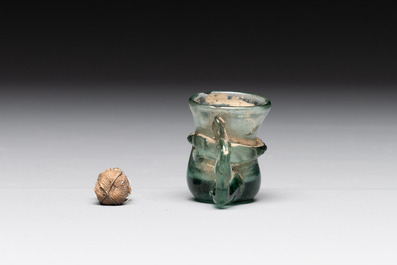 A Dutch or German green glass reliquary holder, excavated in Maastricht, 16/17th C.