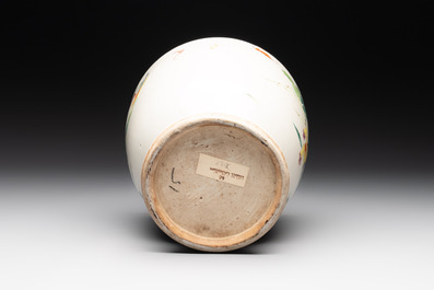 A Chinese famille rose 'warrior on horseback' vase and a wooden cover, Yongzheng/Qianlong
