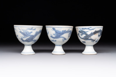 Six Chinese blue and white 'Hatcher cargo' stem cups with dragons, Transitional period