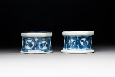 A pair of Chinese gilt-decorated blue and white salts, Qianlong