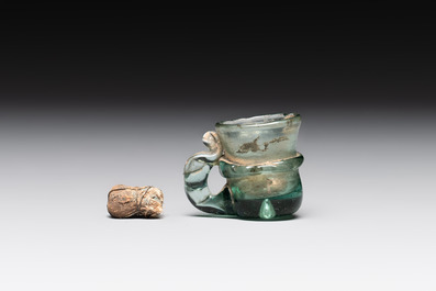 A Dutch or German green glass reliquary holder, excavated in Maastricht, 16/17th C.