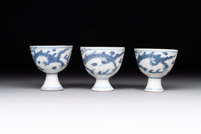 Six Chinese blue and white 'Hatcher cargo' stem cups with dragons, Transitional period
