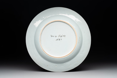 A rare Chinese Dutch-decorated 'The miracle of Zaandam' plate and cup, Qianlong