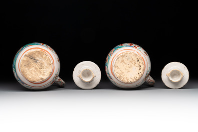 A rare polychrome Dutch Delft petit feu cruet set of two jugs and covers on a stand, 18th C.