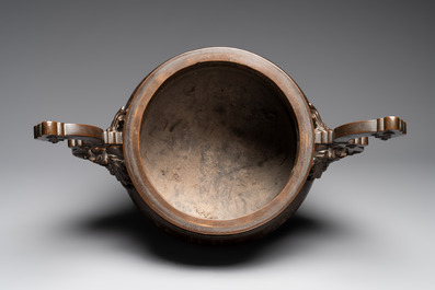 A massive Vietnamese copper- and silver-inlaid 'Buddhist lion' censer and cover on stand, 19th C.