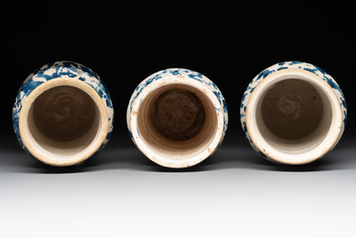 Three blue and white splash-glazed albarelli, Spain, 17th C.