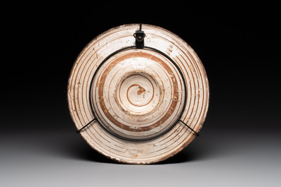 A Hispano-Moresque lustre-glazed dish with stylized floral design, Spain, 16th C.