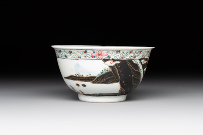 A Chinese famille rose and grisaille 'mountainous landscape' cup and saucer, Yongzheng
