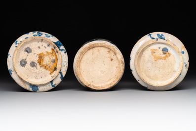 Three blue and white splash-glazed albarelli, Spain, 17th C.