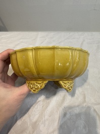 A pair of Chinese yellow-glazed jardini&egrave;res, Yongzheng mark, 20th C.