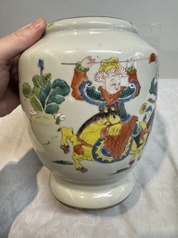 A Chinese famille rose 'warrior on horseback' vase and a wooden cover, Yongzheng/Qianlong