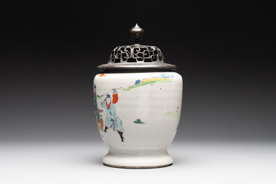 A Chinese famille rose 'riders on horseback' vase and a wooden cover, Yongzheng/Qianlong