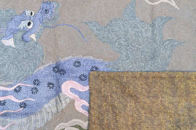 A Japanese embroidered wool and silk wall tapestry with a dragon and qilin, Meiji, 19th C.