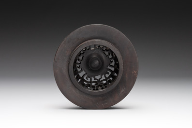 A Chinese famille rose 'riders on horseback' vase and a wooden cover, Yongzheng/Qianlong