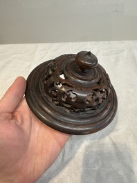 A Chinese blue and white vase with floral design and wooden cover, Transitional period