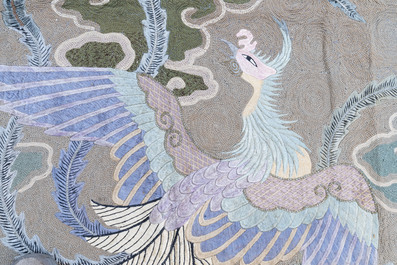 A Japanese embroidered wool and silk wall tapestry with two phoenixes, Meiji, 19th C.
