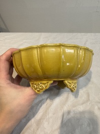 A pair of Chinese yellow-glazed jardini&egrave;res, Yongzheng mark, 20th C.