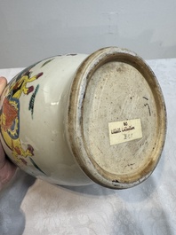 A Chinese famille rose 'warrior on horseback' vase and a wooden cover, Yongzheng/Qianlong