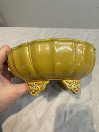 A pair of Chinese yellow-glazed jardini&egrave;res, Yongzheng mark, 20th C.