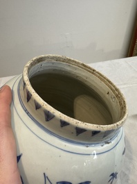 A Chinese blue and white vase with floral design and wooden cover, Transitional period