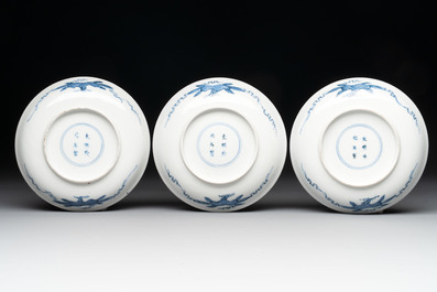 11 Japanese blue and white cups and 12 saucers with floral design, Chenghua mark, Meiji, 19th C.