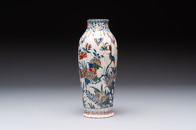 A fine polychrome Dutch Delft cashmere palette ribbed vase with birds among flowering branches, early 18th C.