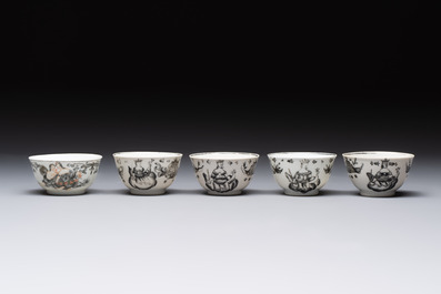 Four Chinese gilt-decorated grisaille 'crowned Juno and peacock' cups and saucers and a 'European subject' cup and saucer, Qianlong