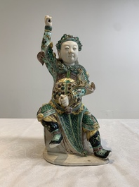 A fine Chinese verte biscuit sculpture of a warrior, 19th C.
