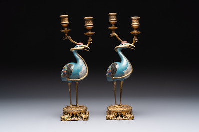 A pair of Chinese cloisonn&eacute; cranes, later mounted as candelabras, 18th C.