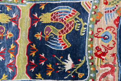Two Tibetan saddle rugs with dragons and phoenixes, 19th C.