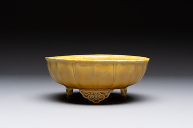 A pair of Chinese yellow-glazed jardini&egrave;res, Yongzheng mark, 20th C.