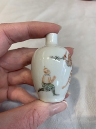 Three Chinese porcelain snuff bottles and a red Peking glass snuff bottle, Daoguang and Tongzhi mark, 19th C.