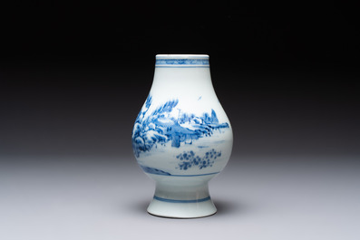 A Chinese blue and white 'mountainous landscape' vase, Yongzheng mark and of the period