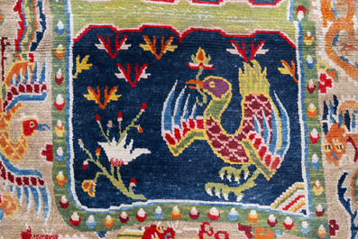 Two Tibetan saddle rugs with dragons and phoenixes, 19th C.